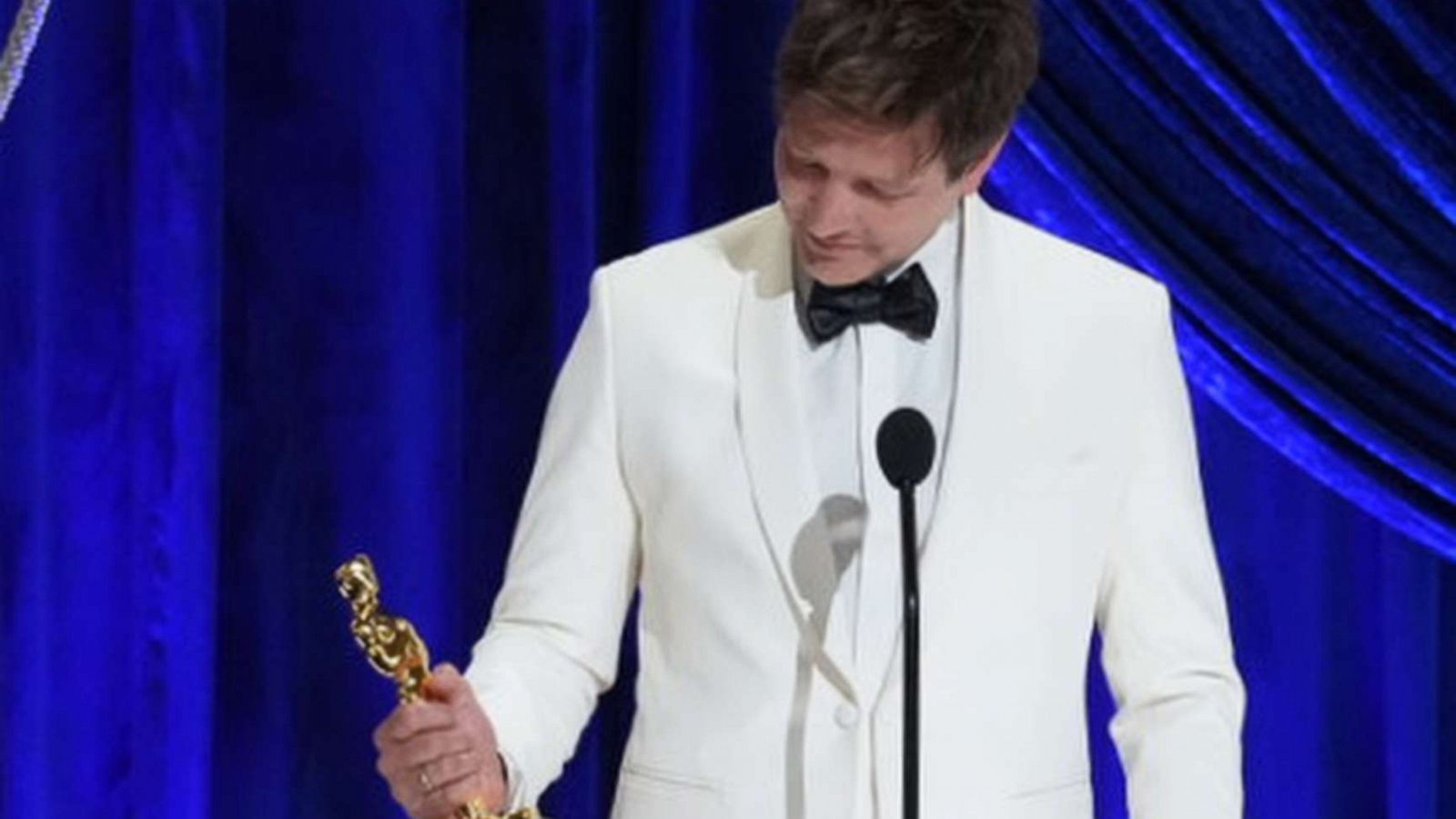 PHOTO: Director Thomas Vinterberg accepts the Oscar for Best International Feature for "Another Round," April 25, 2021, in Los Angeles.