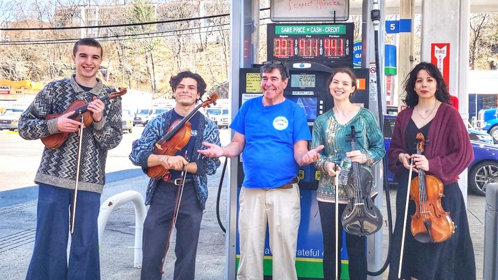 PHOTO: A rotation of violists are performing live music for customers at Quincy Gas station in Quincy, Massachusetts.