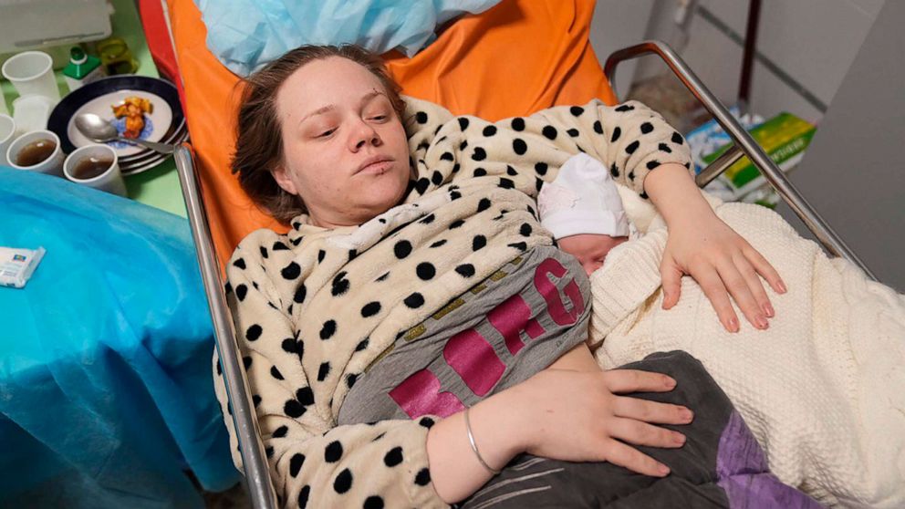 PHOTO: Mariana Vishegirskaya lies in a hospital bed after giving birth to her daughter Veronika, in Mariupol, Ukraine, March 11, 2022. Vishegirskaya survived the Russian airstrike on a maternity hospital in Mariupol March 9.