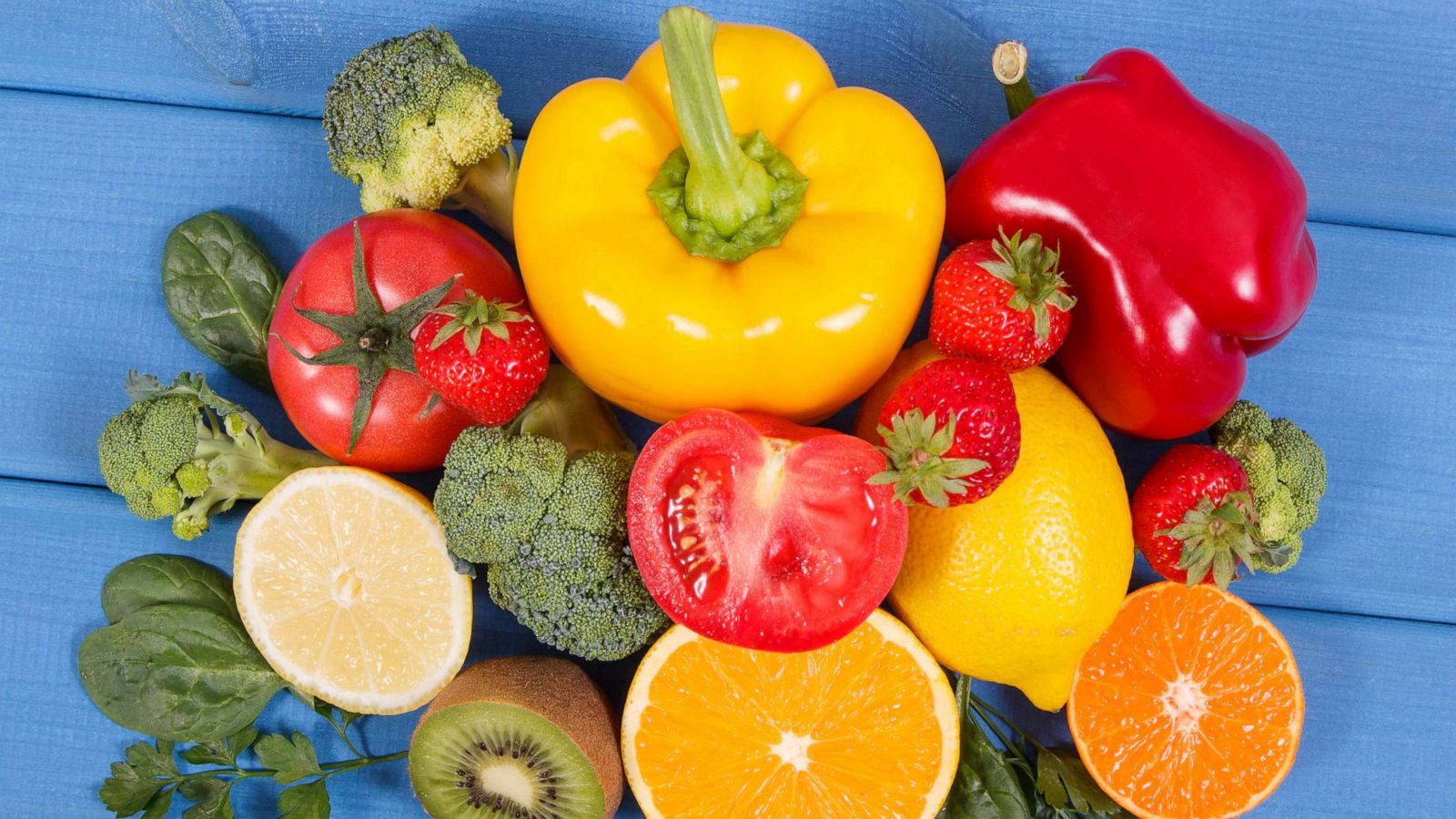 PHOTO: Fresh fruits and vegetables such as bell peppers, broccoli, kiwi, lemons and strawberries are good sources of vitamin C.