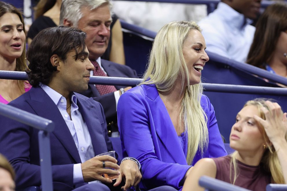 PHOTO: American former World Cup alpine ski racer Lindsey Vonn (R) and boyfriend Diego Osorio are seen during the Women's Singles First Round match between Gauff of the United States and Siegemund of Germany on Aug. 28, 2023 in New York City.