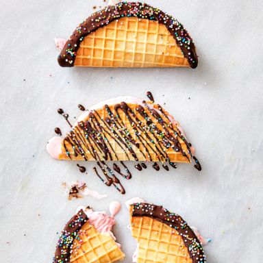 PHOTO: A homemade waffle cone filled with ice cream, dipped in chocolate shell coating.