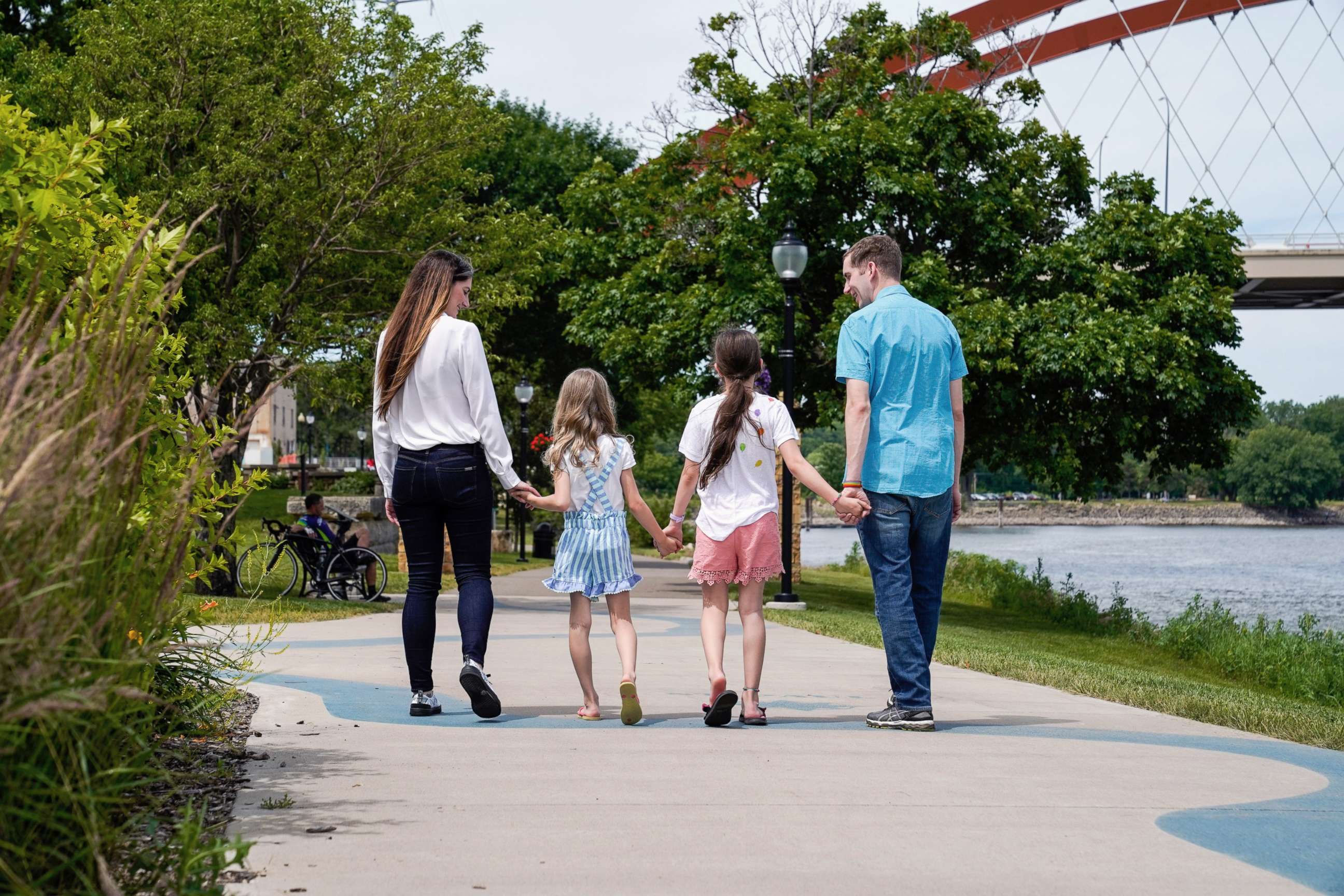 PHOTO: Kelsey and Chris Waits walk with their children in Hastings, Minn., in 2020.