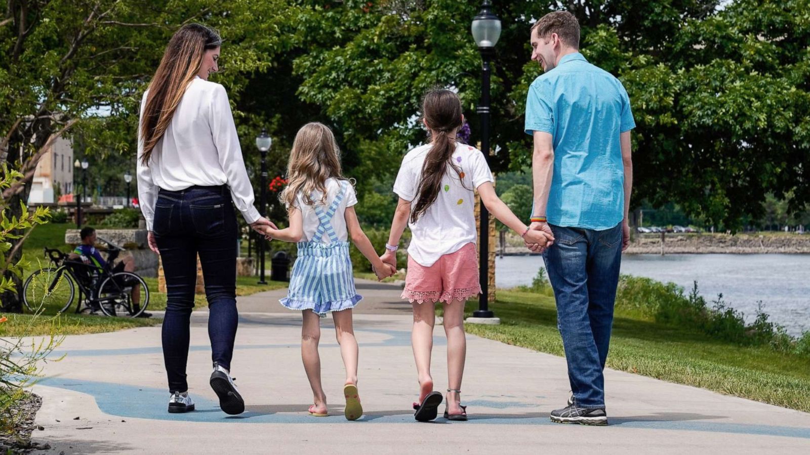 PHOTO: Kelsey and Chris Waits walk with their children in Hastings, Minn., in 2020.