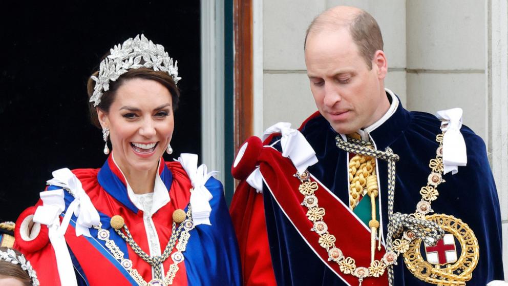 PHOTO: Prince Louis of Wales, Catherine, Princess of Wales and Prince William, Prince of Wales watch an RAF flypast from the balcony of Buckingham Palace following the Coronation of King Charles III & Queen Camilla at Westminster Abbey on May 6, 2023.