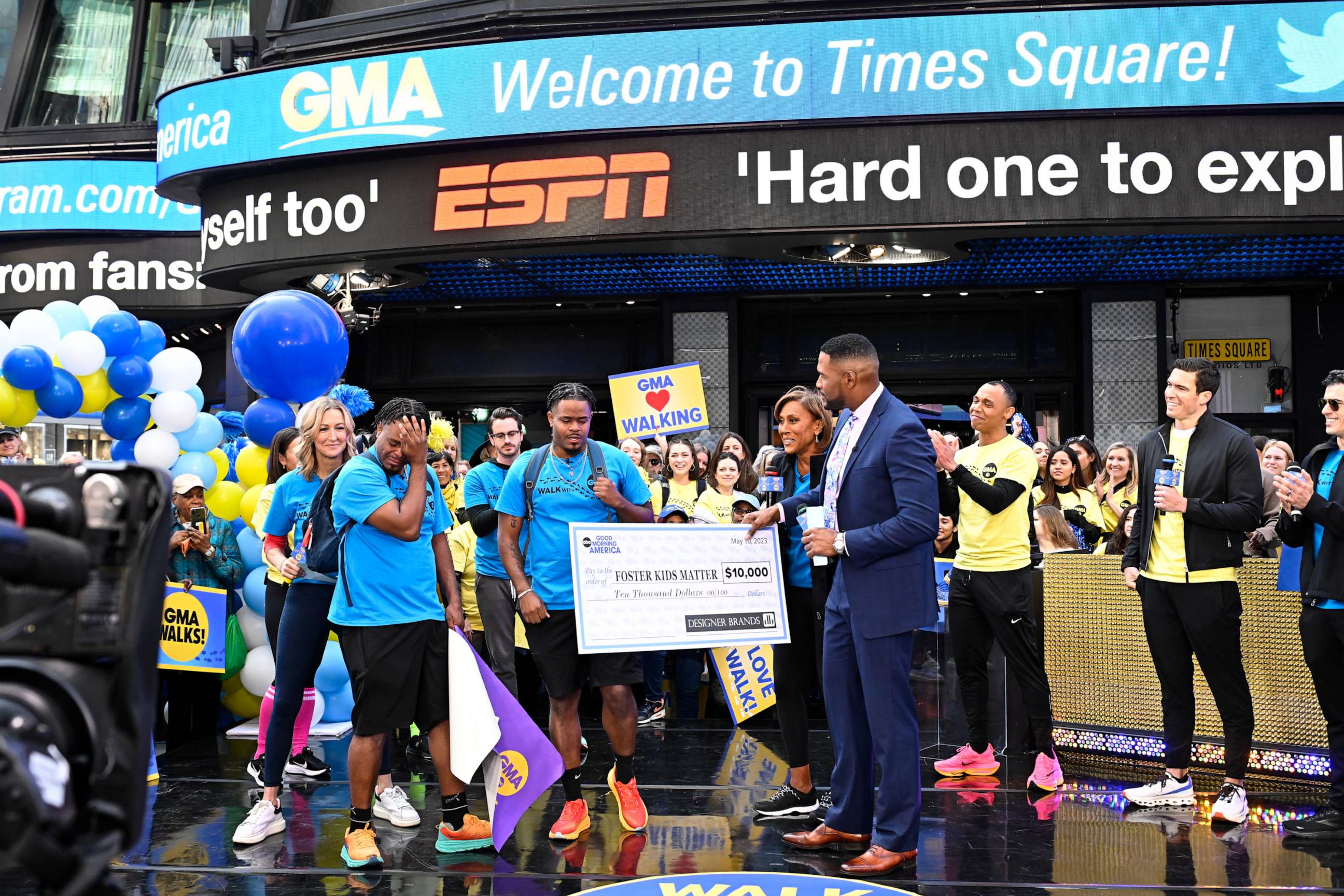 PHOTO: Twin brothers Davon and Tavon Woods are tearful after getting a $10K surprise, May 10, 2023, on "Good Morning America."