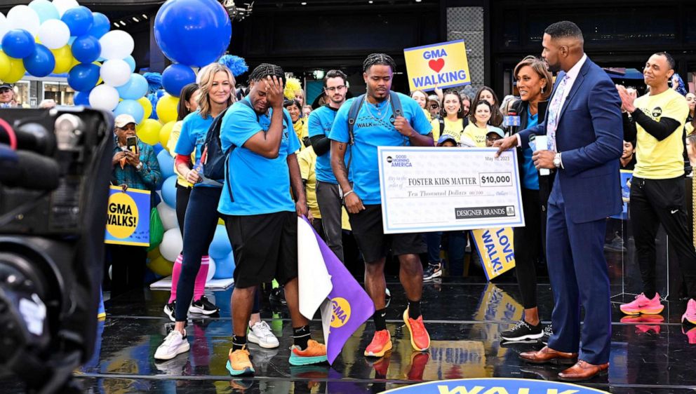 PHOTO: Twin brothers Davon and Tavon Woods are tearful after getting a $10K surprise, May 10, 2023, on "Good Morning America."