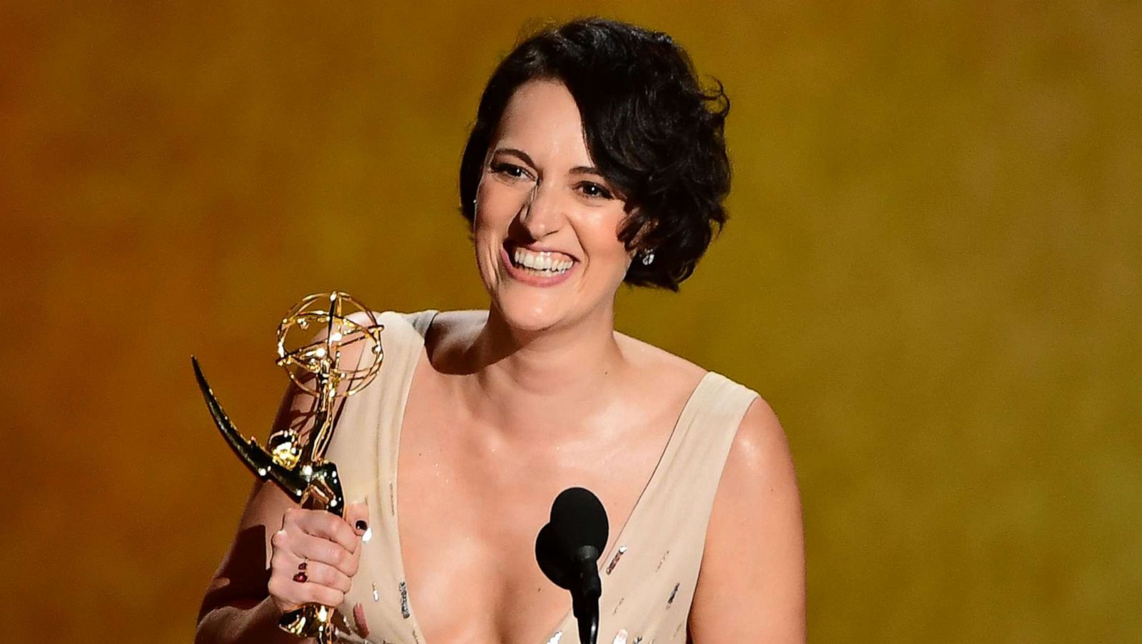 PHOTO: Phoebe Waller-Bridge accepts the award onstage for Outstanding Writing For A Comedy Series during the 71st Emmy Awards at the Microsoft Theatre in Los Angeles on September 22, 2019.