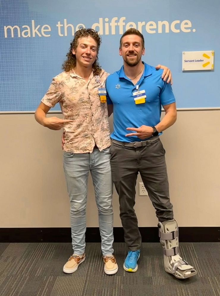 PHOTO:  Seth Goshorn followed his younger brother, Heath, to Walmart. The two siblings are now both coaches for the retailer, with Seth as a stocking coach and Heath as an academy coach who trains managers.