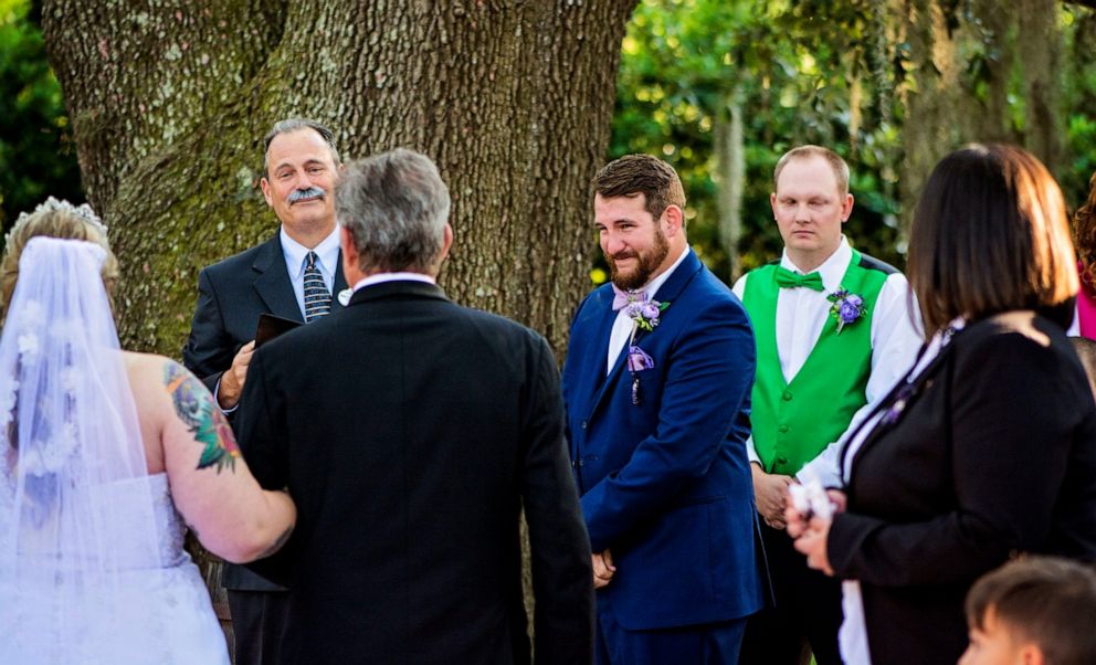 PHOTO: Brian Berigan, bride Taylor Chewning's boss, officiated her wedding on May 17, 2019 dressed as Walt Disney.