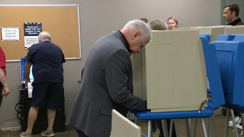 PHOTO:  Democratic vice presidential candidate and Minnesota Governor Tim Walz casts his vote Oct. 23, 2024, in Saint Paul, Minn.