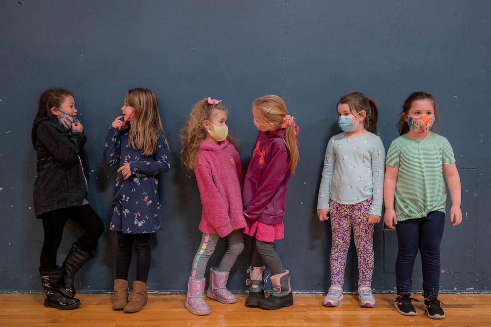 PHOTO: First graders talk during recess at the Green Mountain School on Feb. 18, 2021, in Woodland, Wash.