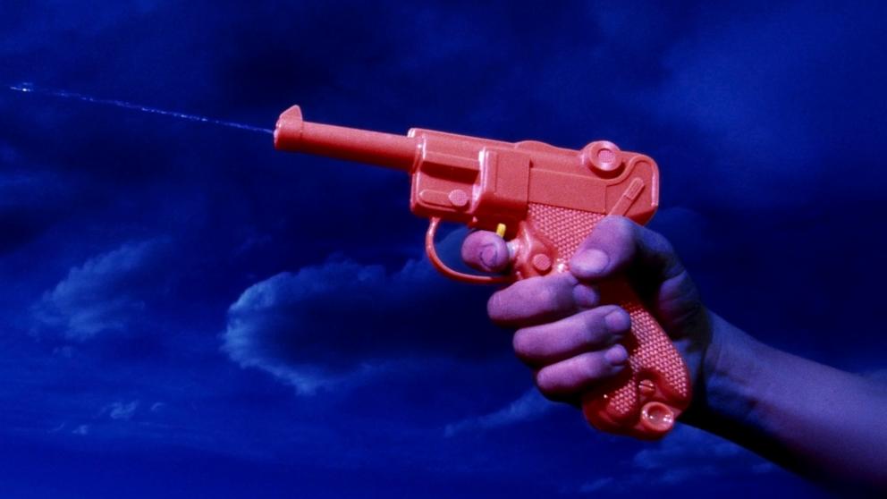 PHOTO: A person shoots with a watergun.