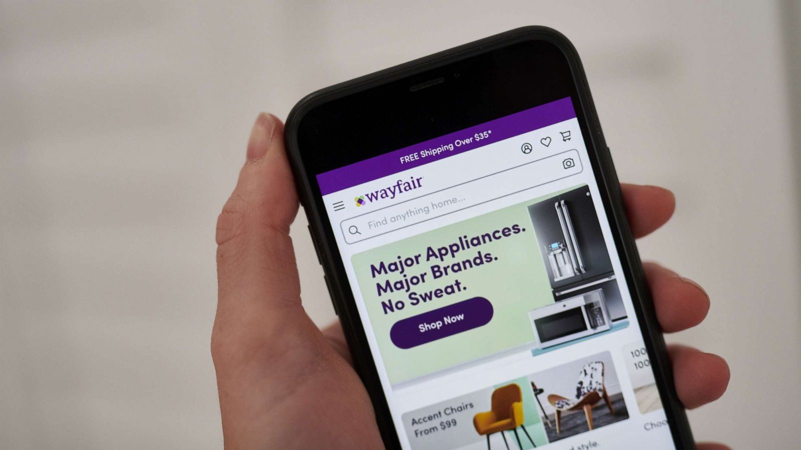 PHOTO: The Wayfair Inc. website on a smartphone arranged in Saint Thomas, Virgin Islands, Feb. 18, 2021.