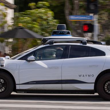 PHOTO:Passengers ride in an electric Jaguar I-Pace car outfitted with Waymo full self-driving technology in Santa Monica, Calif., Feb. 21, 2023. 