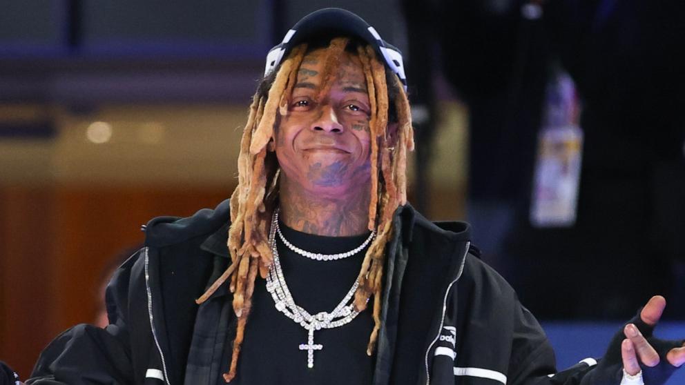 PHOTO: Lil Wayne poses for a photo during the Ruffles NBA All-Star Celebrity Game at Lucas Oil Stadium, Feb. 16, 2024, in Indianapolis.