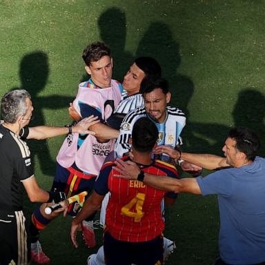 PHOTO: Leandro Paredes of Argentina and Eric Garcia of Spain have words after the FIFA World Cup 2026 final match in East Rutherford, New Jersey, July 19, 2026.