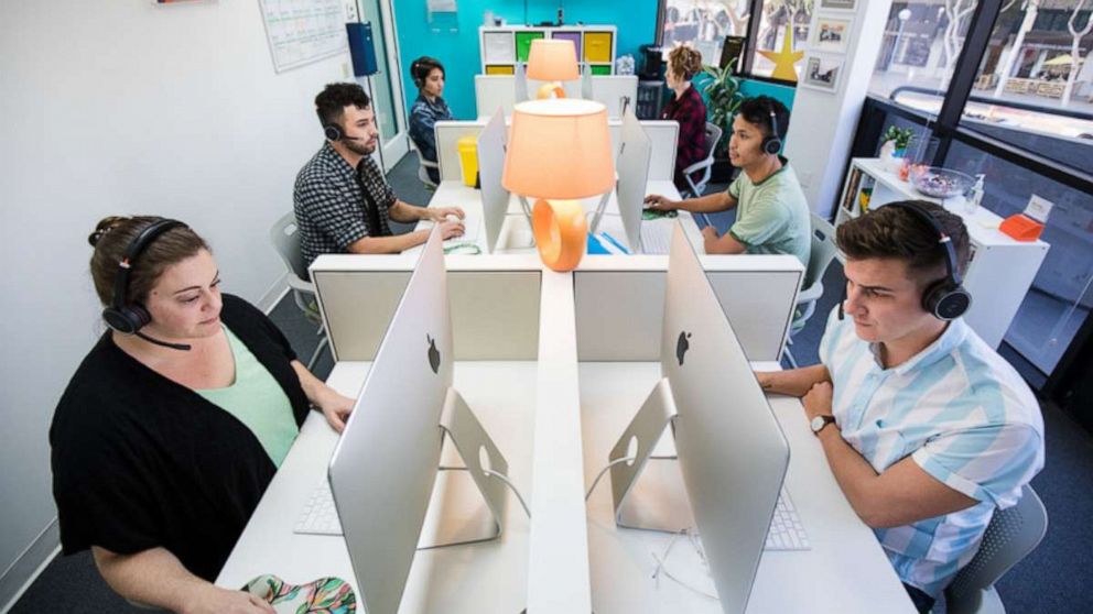 PHOTO: Trevor Project counselors take calls at their Los Angeles call center.