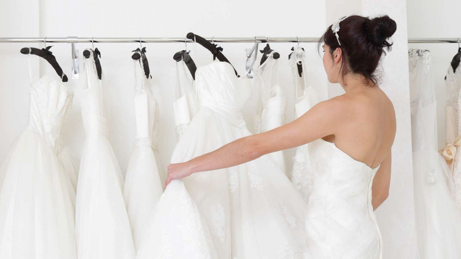 PHOTO: A woman looks for a wedding dress in a stock photo.