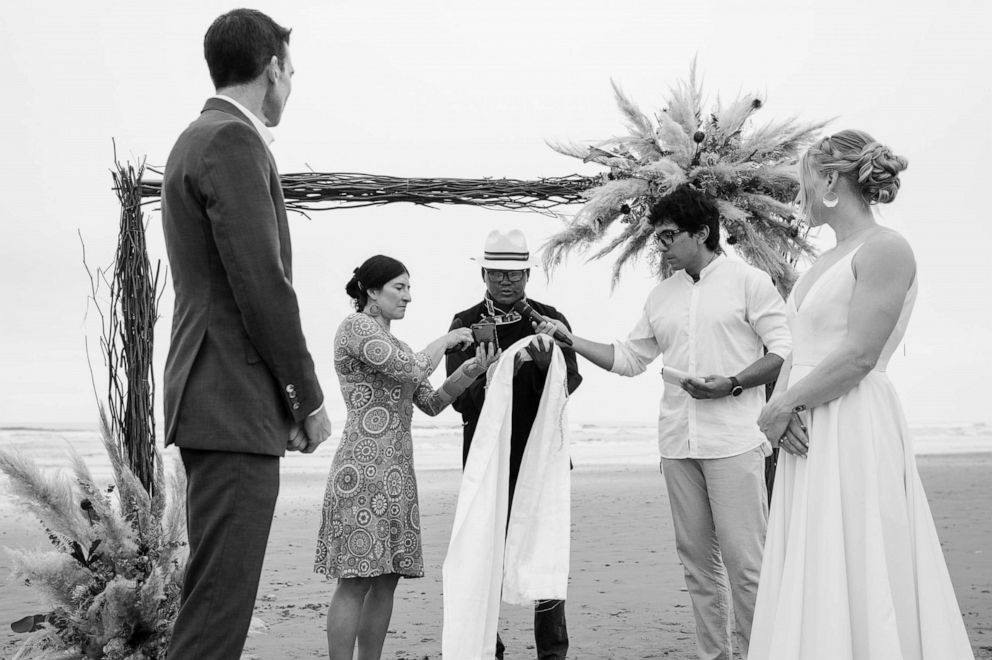 PHOTO: Rock climber Emily Harrington and mountaineer Adrian Ballinger are married by mountaineers Esteban "Topo" Mena and Carla Perez, with Dorji Sonam, who blessed the rings.