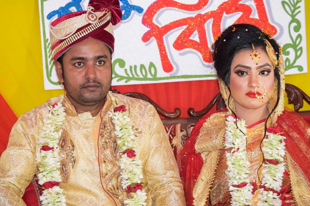 PHOTO: Groom Tariqul Islam and bride Khadiza Akter Khushi pose for a photo during their wedding in Meherpur, Sept. 21, 2019. 