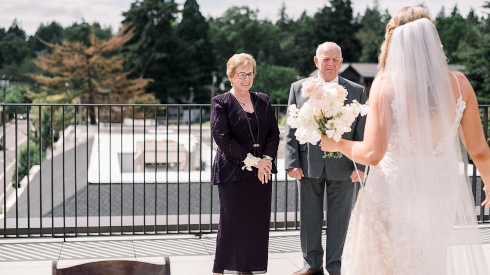 PHOTO: Before Kelsey Rondenet married, she had a special first look moment with her grandparents Mary Hamel and Don Hamel.