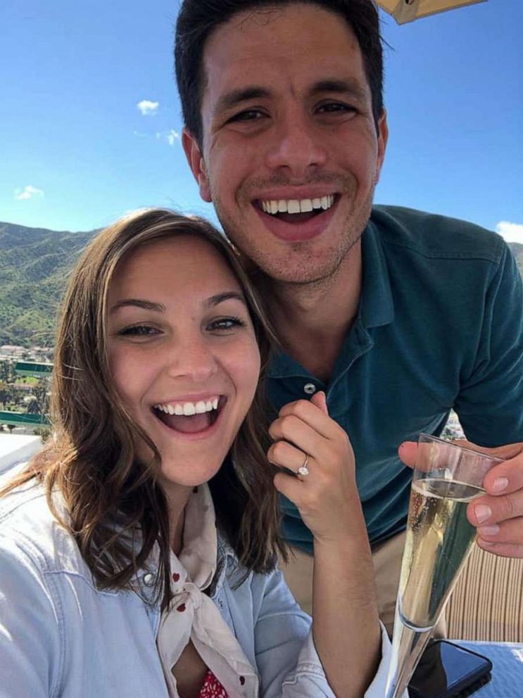 
Tavi Kaunitz and her fiance Tom Lerner, pose for a photo after their engagement. The couple had to postpone their wedding earlier this year due to COVID-19.