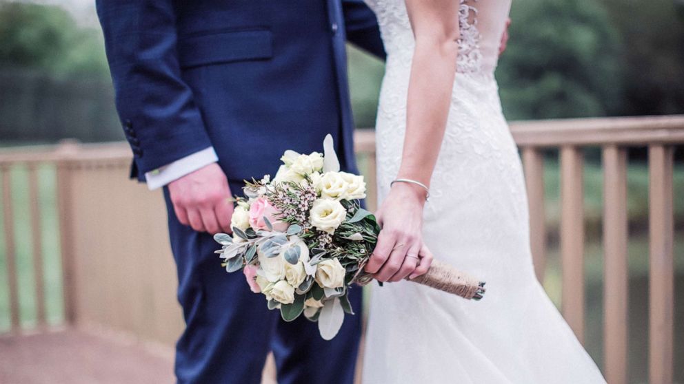 PHOTO: A groom and bride are seen here in an undated stock photo.