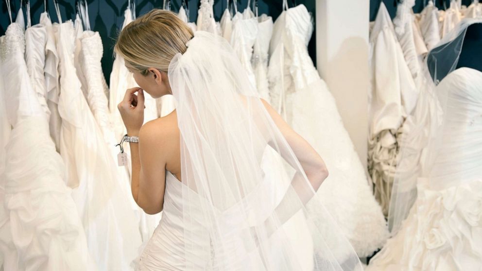 PHOTO: A woman looks at wedding dresses in this stock photo.