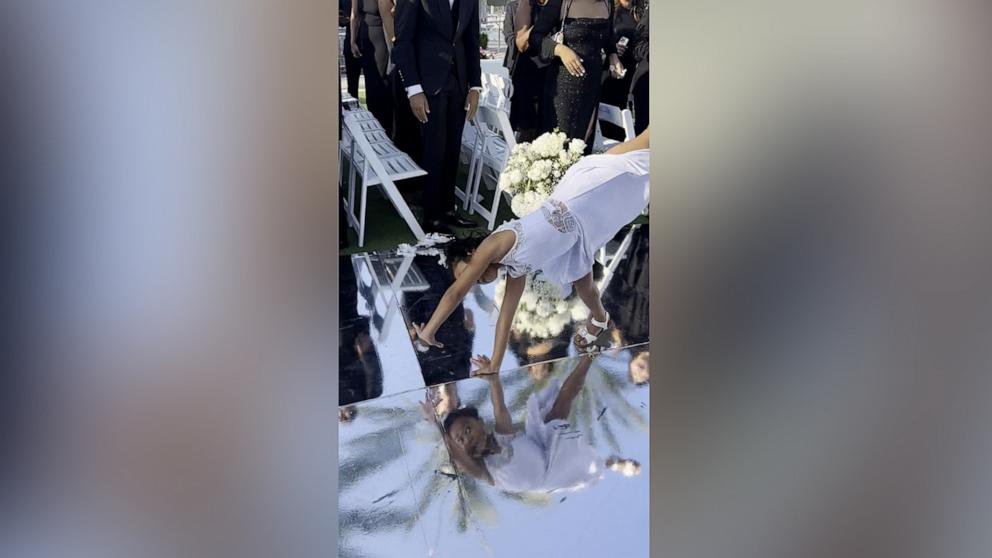 PHOTO: Raina Elegado's daughter, a competitive dancer, performed flips while she served as a flower girl at a wedding in Carlsbad, Calif. A video of her performance has gone viral on TikTok with over 1 million views.