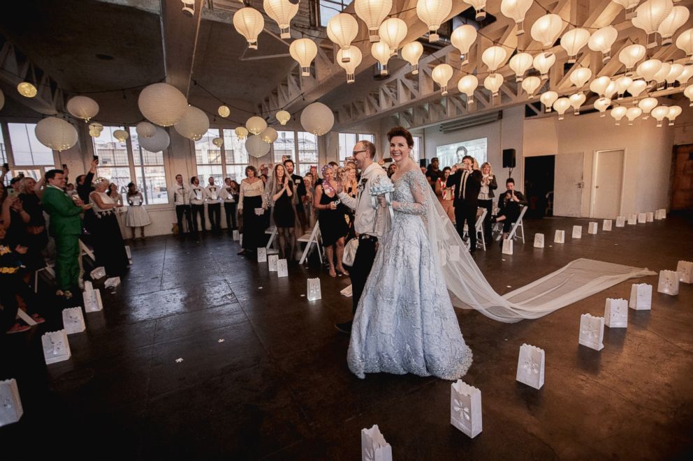 PHOTO: Audrey Moore, an actress living in California, wore a long-sleeve blue, wedding gown as she wed Jesse Lumen on Dec. 30, 2018.