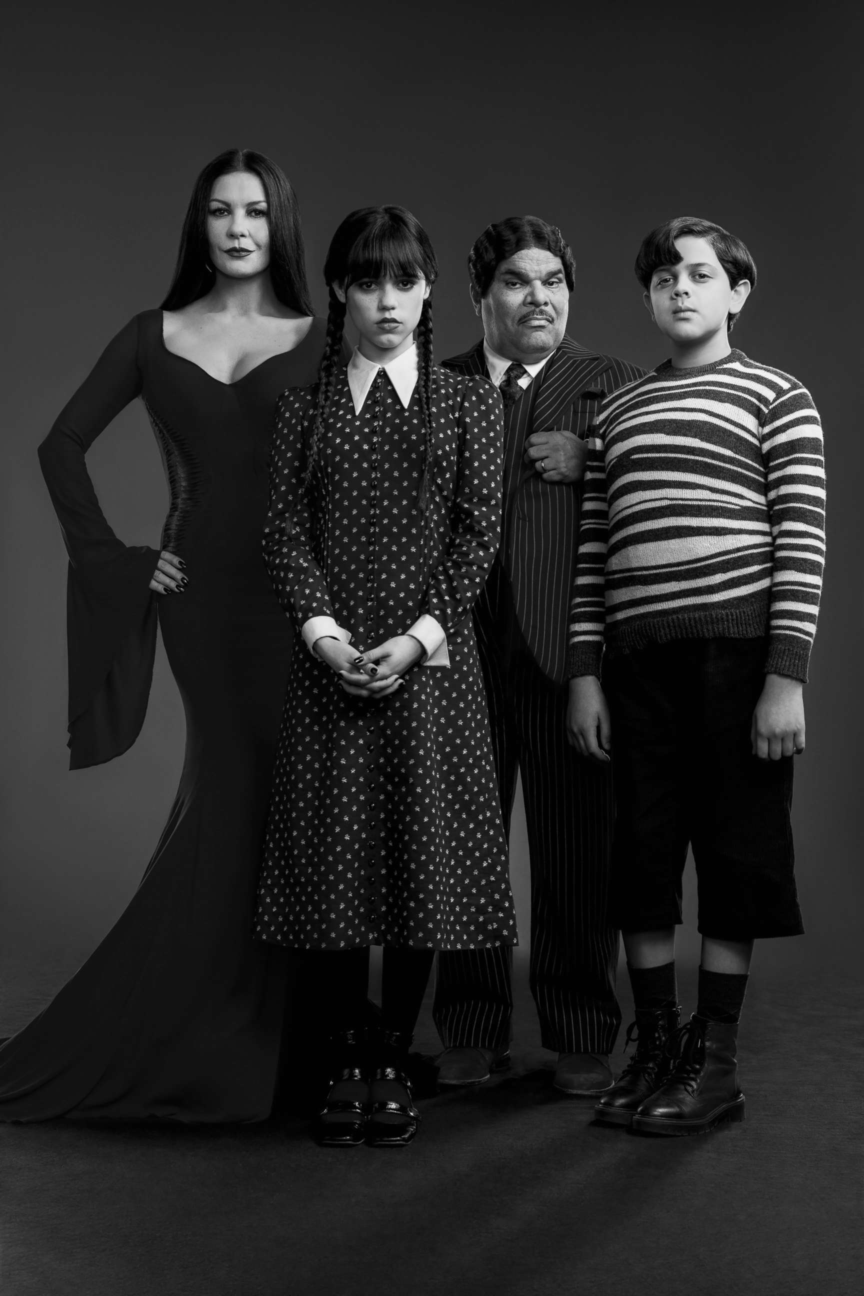 PHOTO: The cast of Netflix's "Wednesday," (L to R) Catherine Zeta-Jones as Morticia Adams, Jenna Ortega as Wednesday Addams, Luis Guzman as Gomez Addams, Issac Ordonez as Pugsley Addams.