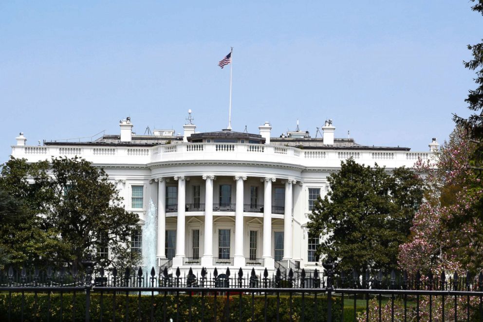 PHOTO: An American flag flies over the south facade of the White House in Washington, D.C., April 22, 2018. 