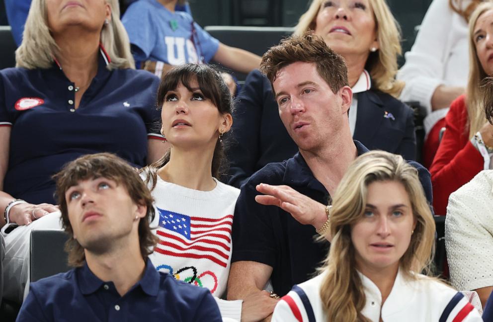 PHOTO: Nina Dobrev (L) and Shaun White look on during the Artistic Gymnastics Women's Qualification on day two of the Olympic Games Paris 2024 at Bercy Arena on July 28, 2024 in Paris.