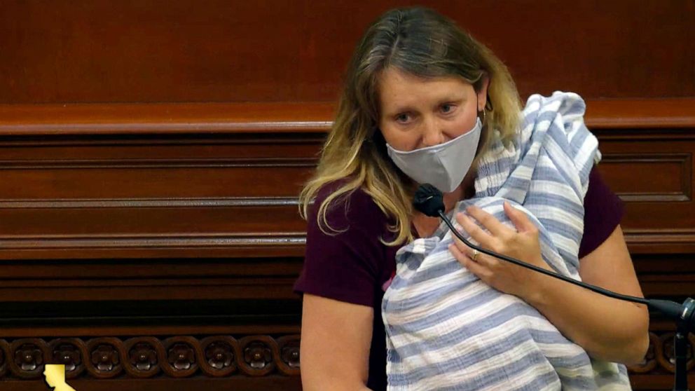 PHOTO: Assemblywoman Buffy Wicks, a Democrat from Oakland, addresses lawmakers on a housing bill while holding her one-month-old daughter Elly in her arms during the final hours of the California legislative session, Aug. 31, 2020, in Sacramento, Calif.