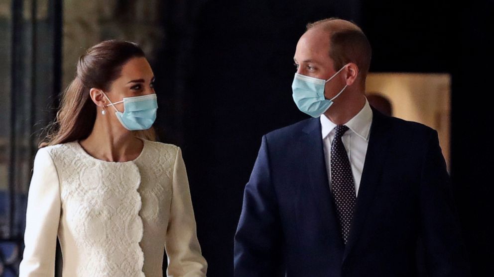PHOTO: Britain's Kate, Duchess of Cambridge and Prince William and arrive for a visit to the vaccination center at Westminster Abbey, London, March 23, 2021.