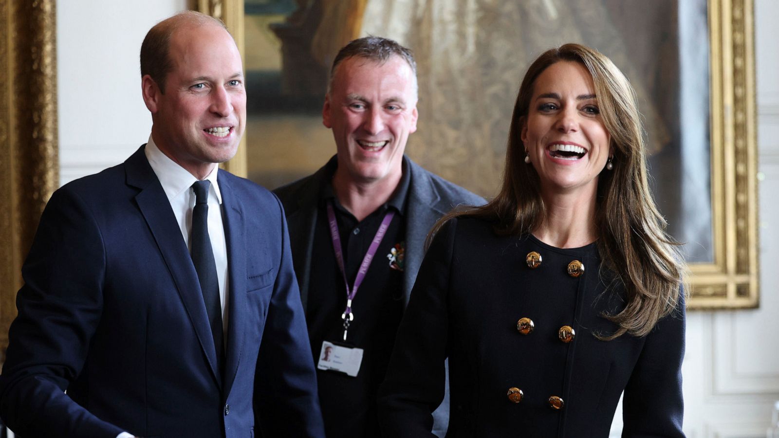 PHOTO: Prince William and Kate, Princess of Wales, meet volunteers and operational staff who were involved in facilitating the Committal Service for Queen Elizabeth II at St George's Chapel, at Windsor Guildhall, Berkshire, Sept. 22, 2022.