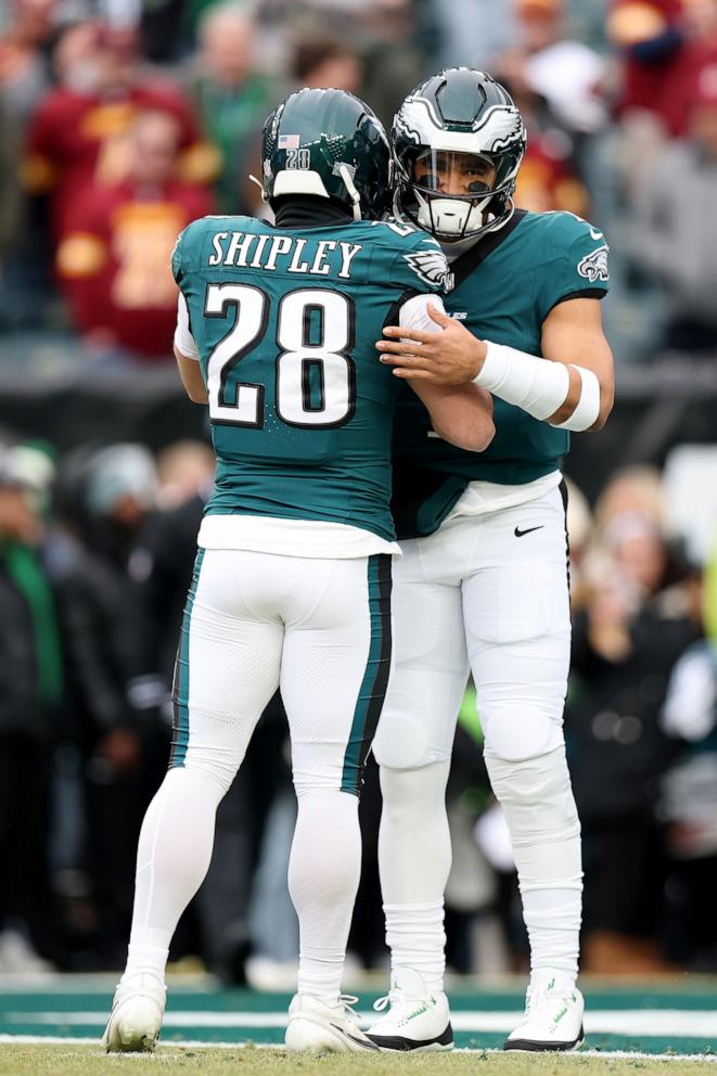 PHOTO: Jalen Hurts #1 of the Philadelphia Eagles hugs Will Shipley #28 prior to the NFC Championship Game against the Washington Commanders at Lincoln Financial Field in Philadelphia, Jan. 26, 2025.