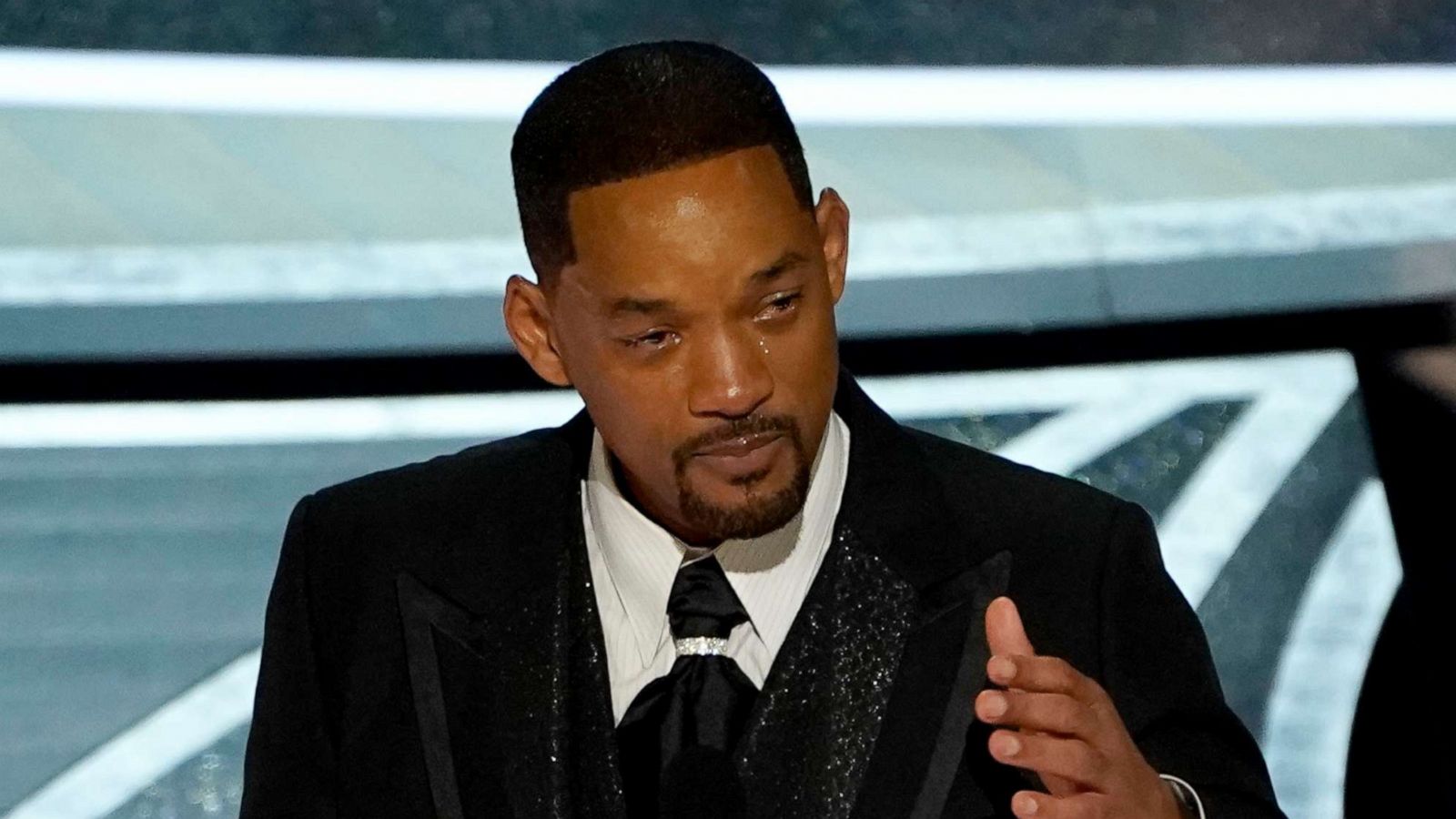 PHOTO: Will Smith cries as he accepts the award for best performance by an actor in a leading role for "King Richard" at the Oscars, March 27, 2022, in Los Angeles.