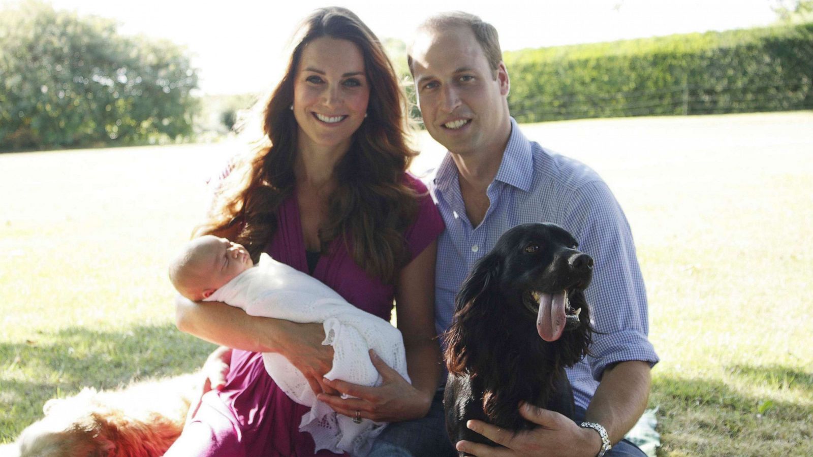 PHOTO: Prince William and Catherine, Duchess of Cambridge, pose in the garden of the Middleton family home in Bucklebury, southern England, with their son Prince George and cocker spaniel Lupo in this undated photograph released Aug. 19, 2013.