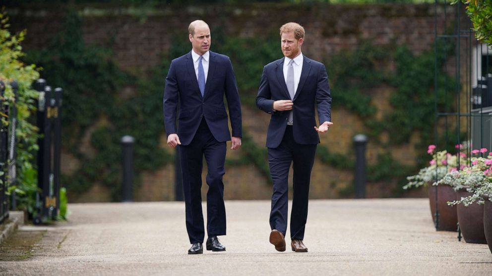 PHOTO: Britain's Prince William and Prince Harry arrive for the statue unveiling on what would have been Princess Diana's 60th birthday, in the Sunken Garden at Kensington Palace, London, July 1, 2021.