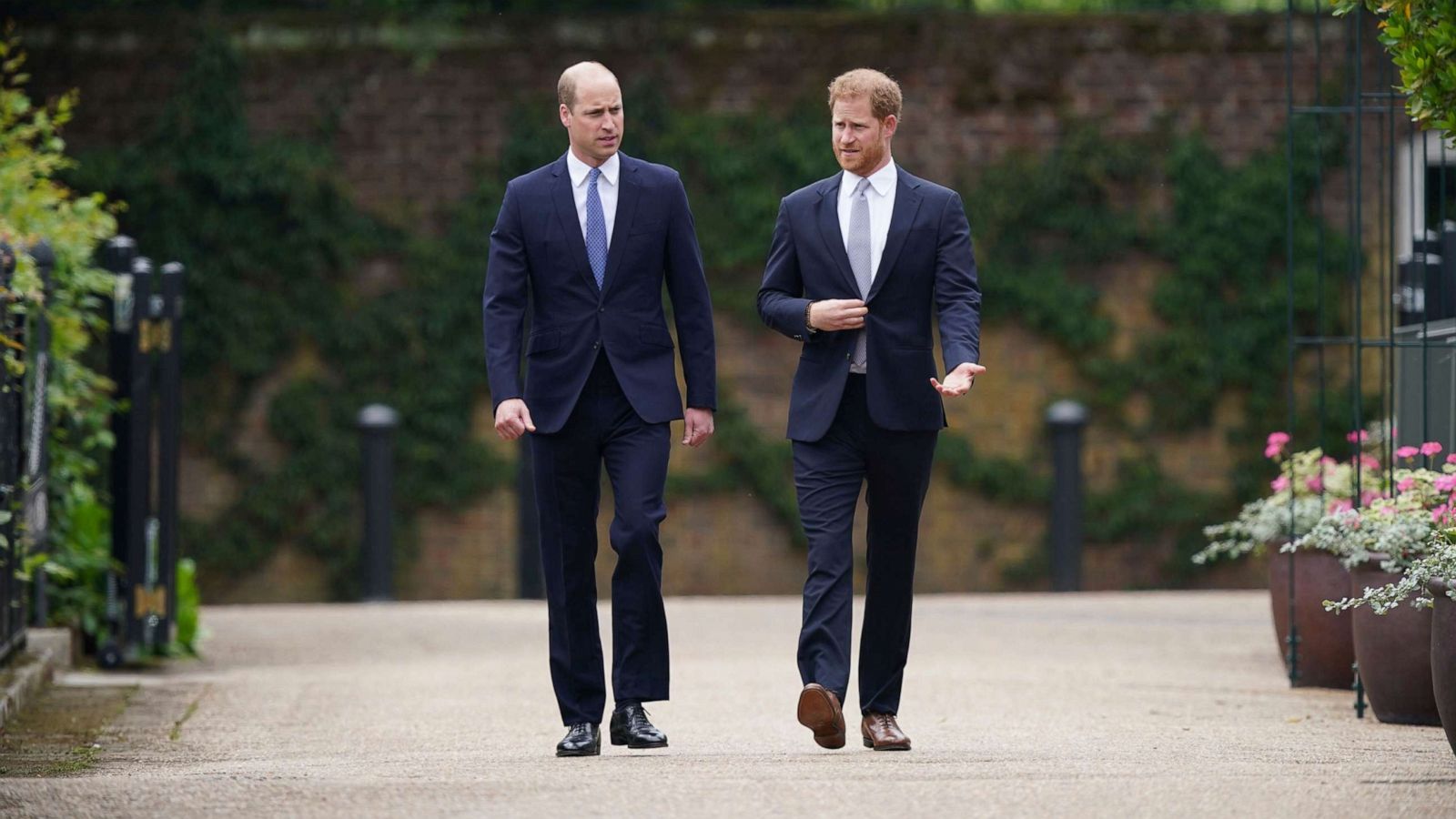 PHOTO: Britain's Prince William and Prince Harry arrive for the statue unveiling on what would have been Princess Diana's 60th birthday, in the Sunken Garden at Kensington Palace, London, July 1, 2021.