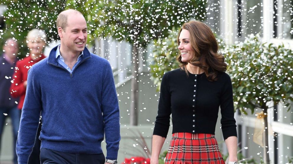 PHOTO: Prince William, Duke of Cambridge and Catherine, Duchess of Cambridge laugh as a machine sprays snow at Kensington Palace, Dec. 4, 2018, in London. 