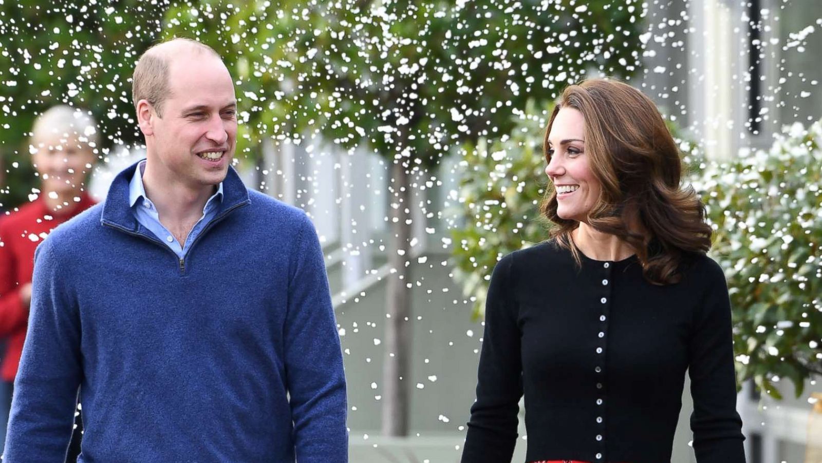 PHOTO: Prince William, Duke of Cambridge and Catherine, Duchess of Cambridge laugh as a machine sprays snow at Kensington Palace, Dec. 4, 2018, in London.