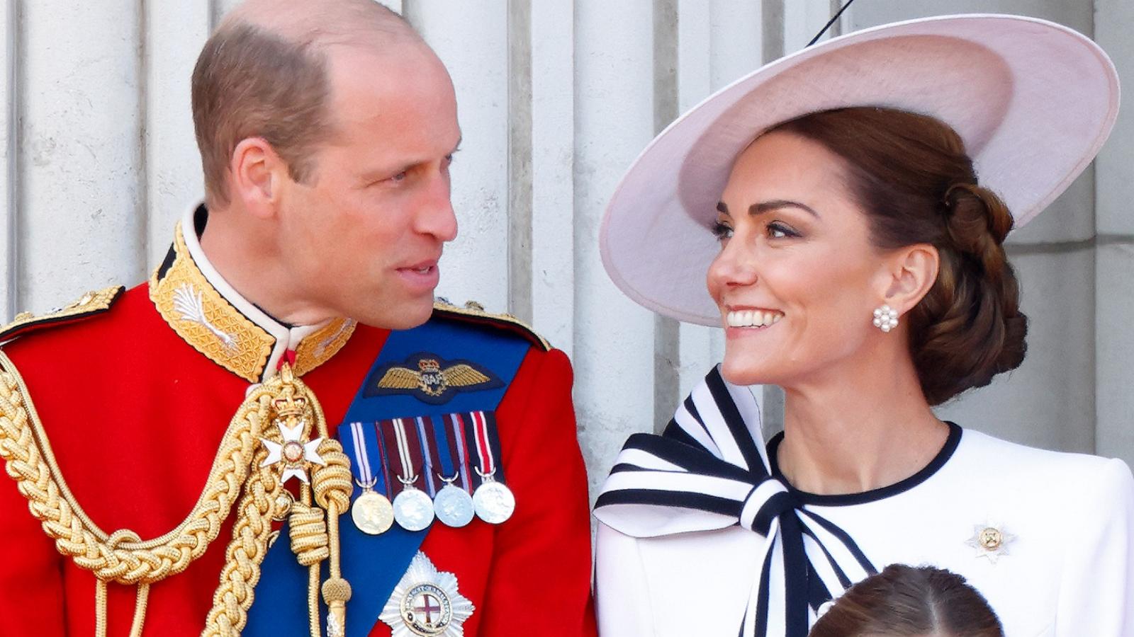 PHOTO: Prince William, Prince of Wales and Catherine, Princess of Wales watch an RAF flypast from the balcony of Buckingham Palace after attending Trooping the Colour, June 15, 2024, in London.