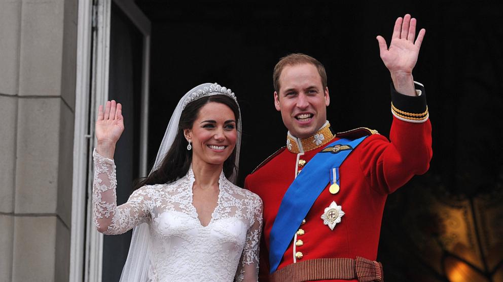 PHOTO: Britain's Prince William and his wife Kate, Duchess of Cambridge, wave to the crowd from the balcony of Buckingham Palace in London, April 29, 2011, following their wedding. 