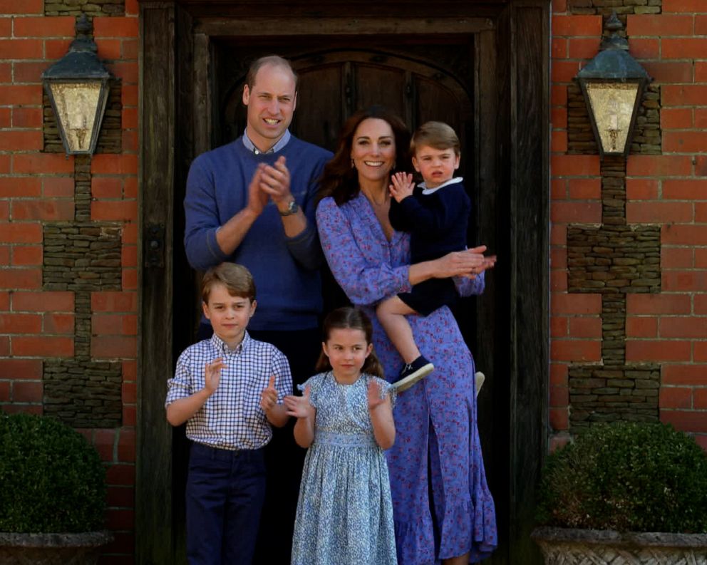 PHOTO: Prince William, Duke of Cambridge, Catherine Duchess of Cambridge, Prince George, Princess Charlotte and Prince Louis clap for NHS carers as part of the BBC Children In Need and Comic Relief 'Big Night In" on April 23, 2020, in London.