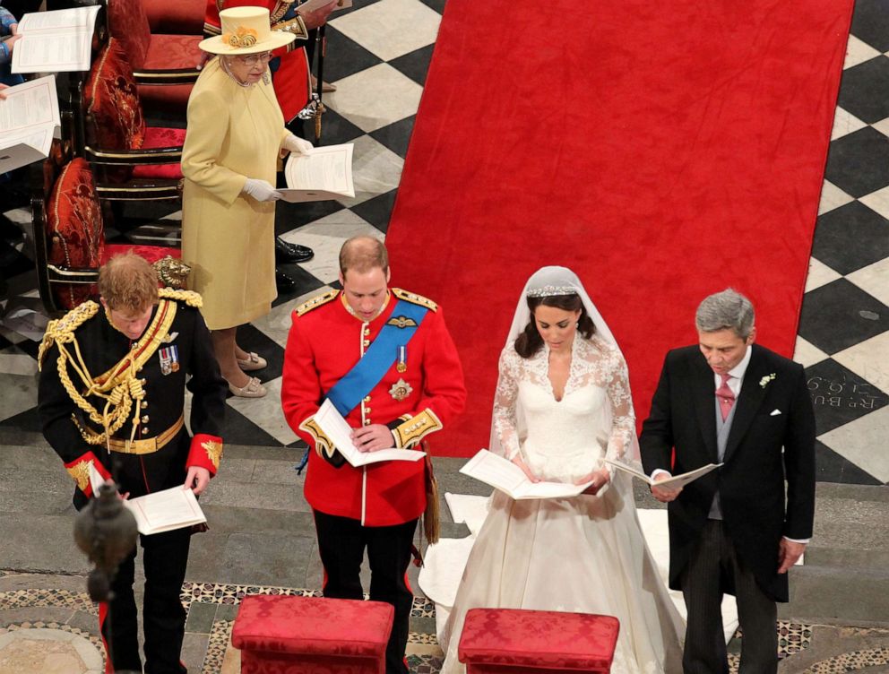 PHOTO: Left, Prince Harry, Prince William Duke of Cambridge, Catherine Duchess of Cambridge and Michael Middleton stand at the altar of Westminster Abbey on April 29, 2011 in London.