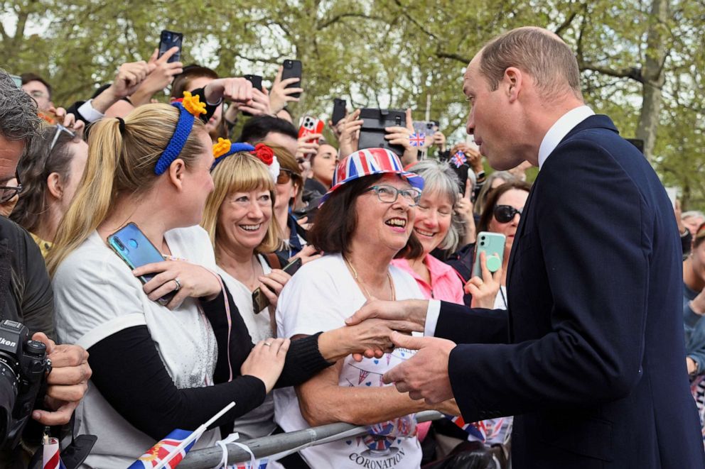 PHOTO: Britain's Prince William meets well-wishers during a walkabout outside Buckingham Palace ahead of the coronation of Britain's King Charles and Camilla, Queen Consort, in London, May 5, 2023.