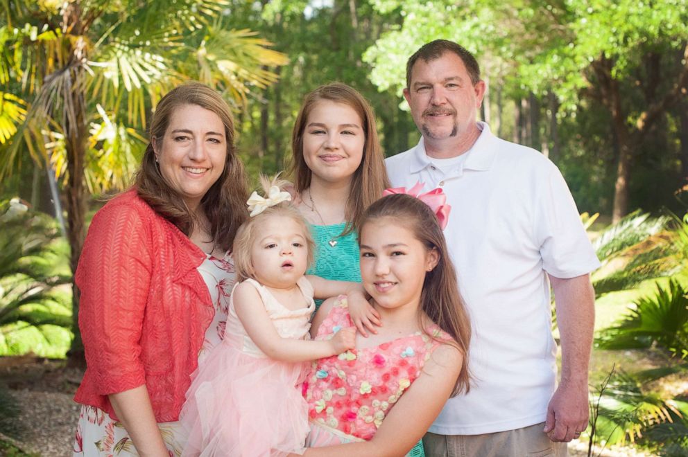 PHOTO: Amber Olsen (left) is pictured with her family. Her daughter, Willow Cannan, has a rare genetic disease, Multiple Sulfatase Deficiency.